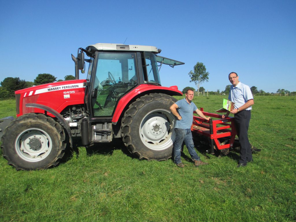 John Conlon, Markethill, with his aerator, discussing arrangements prior to the event with Senan White, CAFRE
