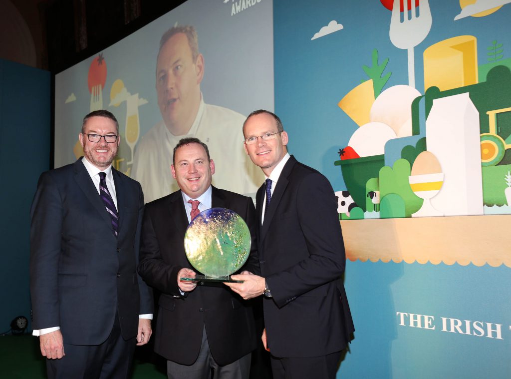 Michael Carey, Chairman, Bord Bia, Pat Whelan from James Whelan Butchers, the inaugural recipient of the Online Champion Award and Simon Coveney TD, Minister of Agriculture, Food and the Marine.