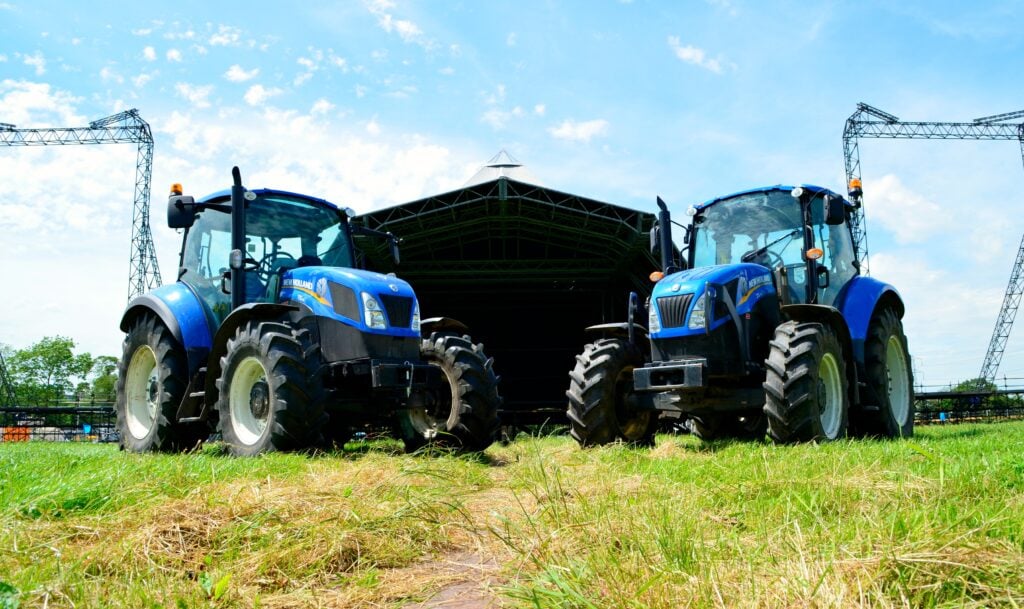 New Holland tractors lined up at Glastonbury, before the mud.