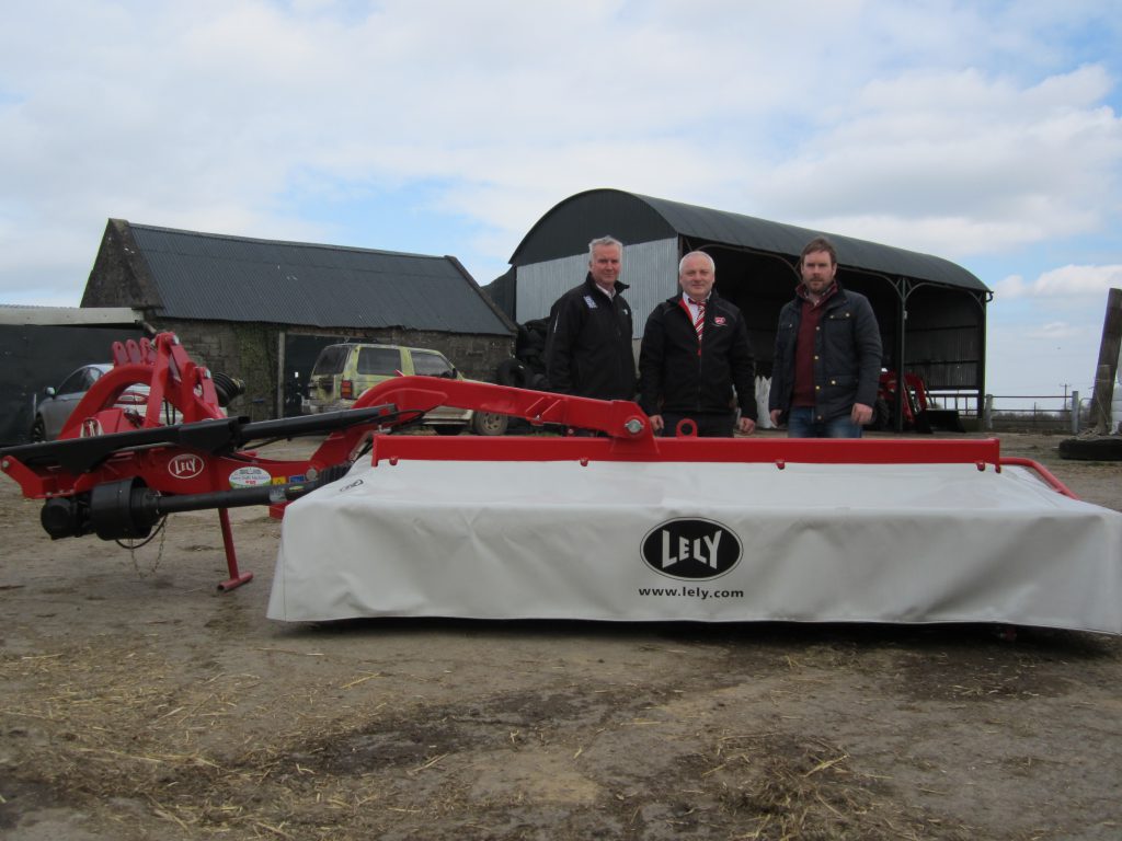 Brian Duffy of Gerry Duffy Machinery and Matt Ferguson, Lely Area Sales Manager presenting a Lely mower