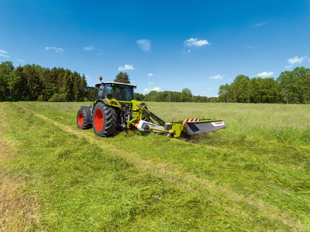 Claas Disco mower in operation.