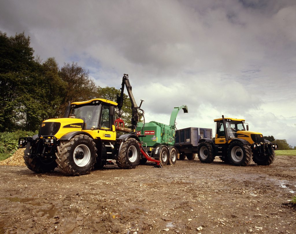 2002 – the 185hp 3220 Fastrac is launched. Pictured here with deck mounted crane and wood chipper
