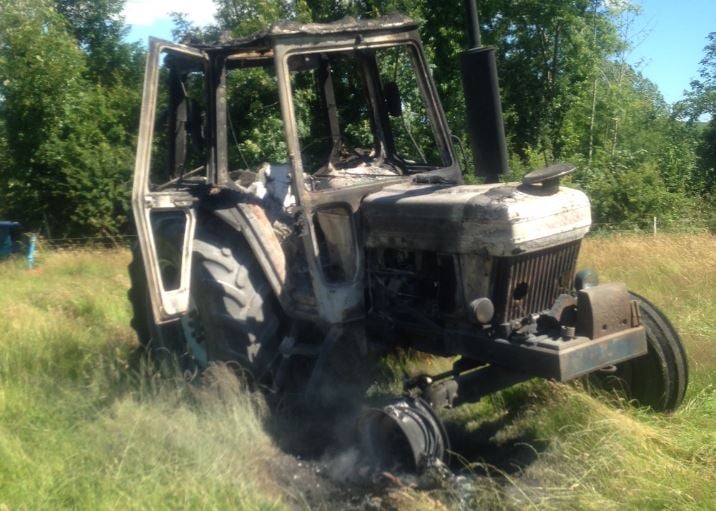 The fire damaged Ford 7610