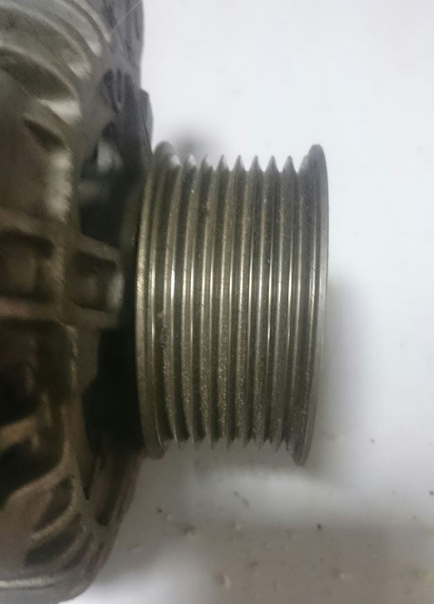 A Poly V belt pulley on a tractor