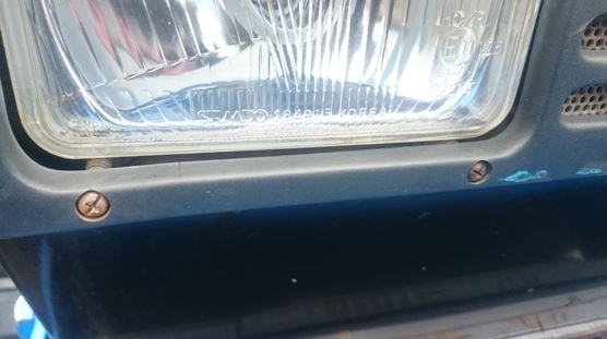 Screws which can be used to adjust focus on lights