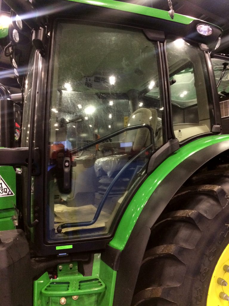 A John Deere 6130R tractor with the B-post door option.