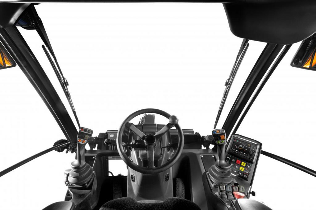 The cab is relatively spacious for such a compact machine.