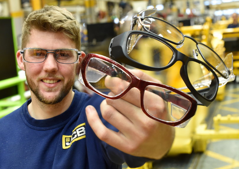 Backhoe loader assembly operative Brett Archer tries out the new JCB safety glasses