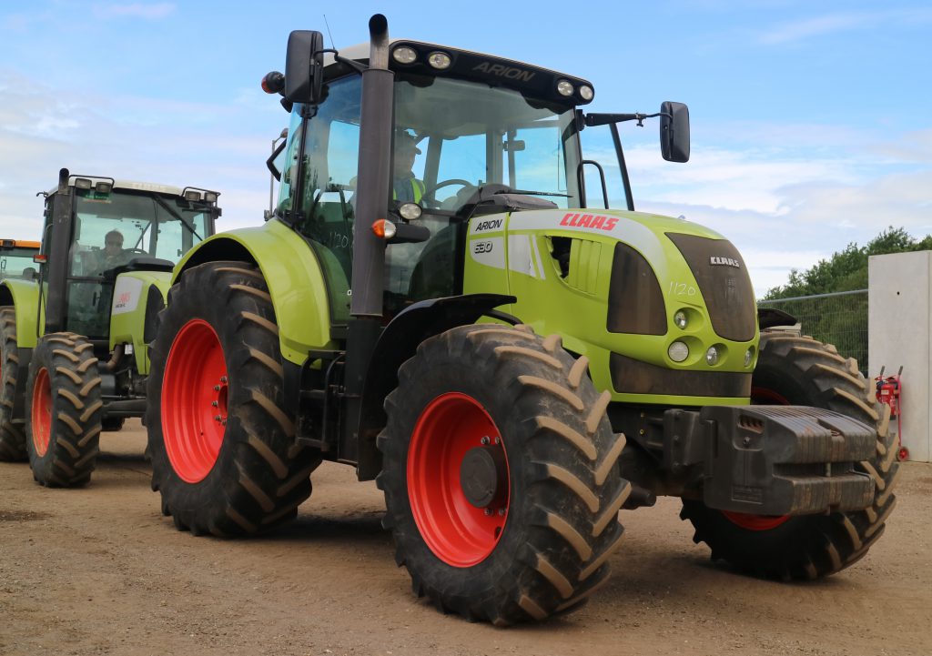 A Claas Arion 630 CEBIS (50kph model), with 4,100 hours showing, sold for €24,224