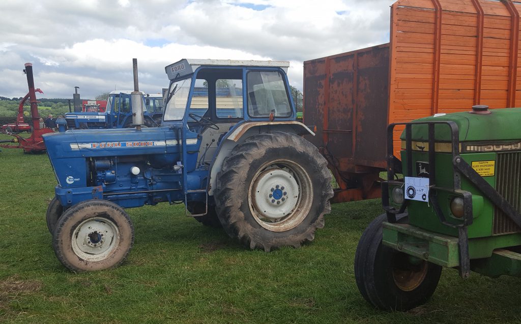 Doors are optional! This ‘original’ Ford 5000 was part of the fleet of equipment needed to ferry grass away from the harvesters – an army of single-chop, double-chop and precision-chop machines