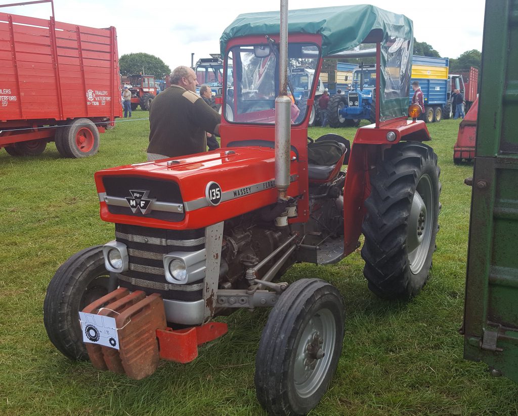 What tractor-themed event would be complete without the omnipresent Massey Ferguson 135. With its canvas-topped cab, this tractor was busy drawing away from a trailed, in-line Krone silage harvester (powered by a 110hp Ford 8210)