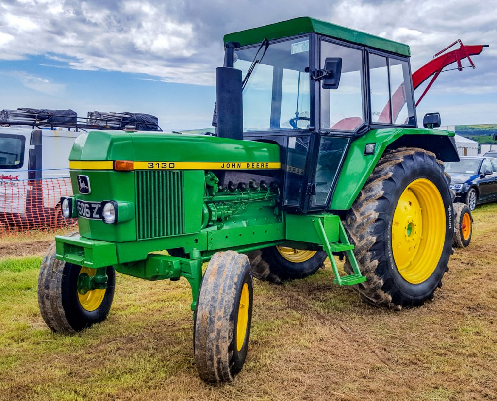 This gleaming John Deere 3130 looked sharp, with its OPU ‘square’ cab. The version pictured has the face-lifted nose and bonnet (having changed to a more ’rounded’ appearance circa 1975). Built in Mannheim, Germany, during the early-to-late 1970s, the 3130 was considered a big powerhouse in its day