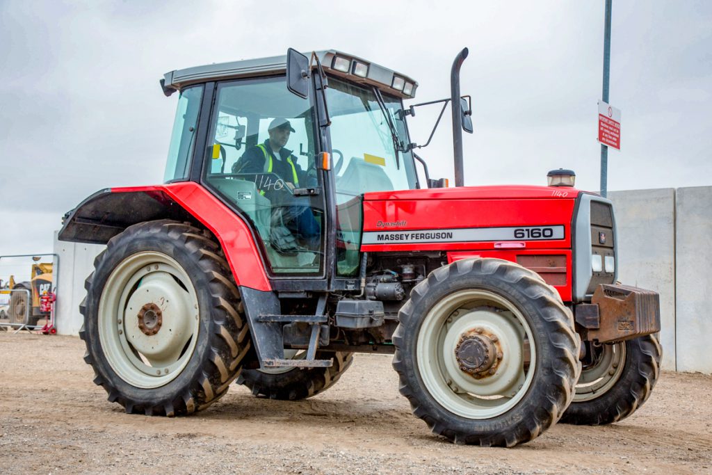 If she’s not red, leave her in the shed: This 1997 Massey Ferguson 6160 (with front weights) was practically on row-crop wheels/tyres. Showing 3,071 hours on the clock, it sold for £9,600