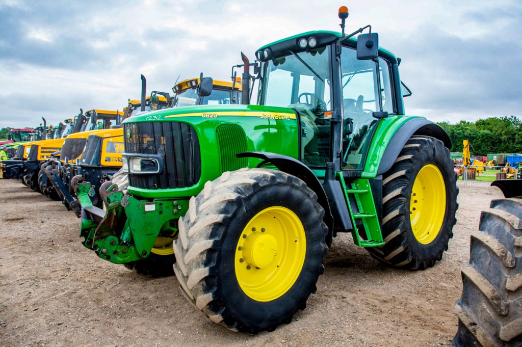 Presentable appearance: This 2004 John Deere 6820 had a substantial 8,256 hours showing on its odometer. It sold for £17,000