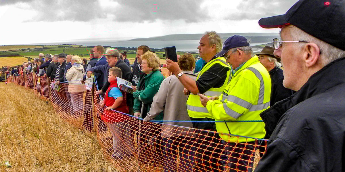 Spectators ranged in age, almost as much as the machines did! While waiting for the next combine harvester to ready itself, there was no shortage of scenery to peruse on the Co. Cork coastline