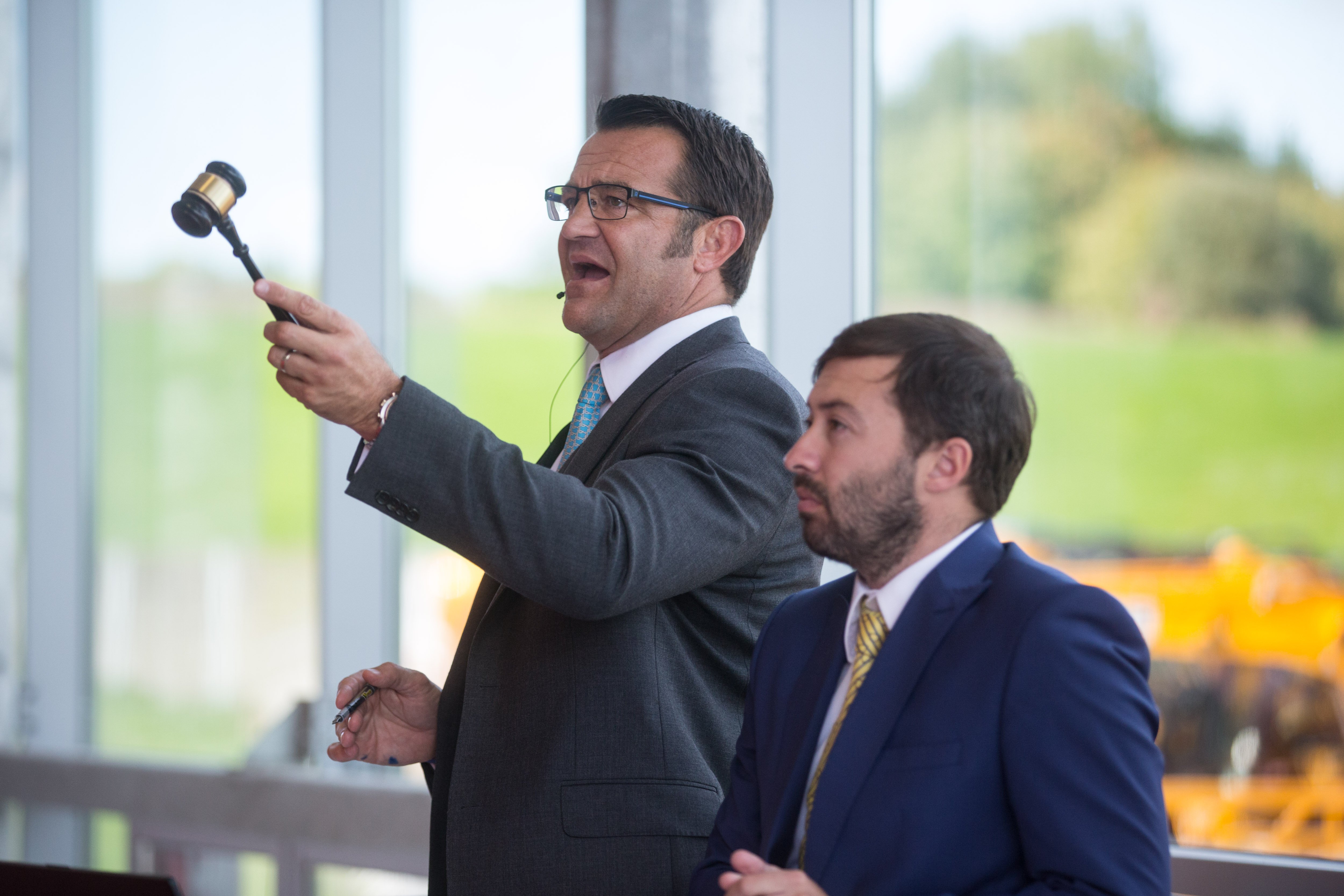 Auctioneer and managing director of AMS, Rob York, in action (left)