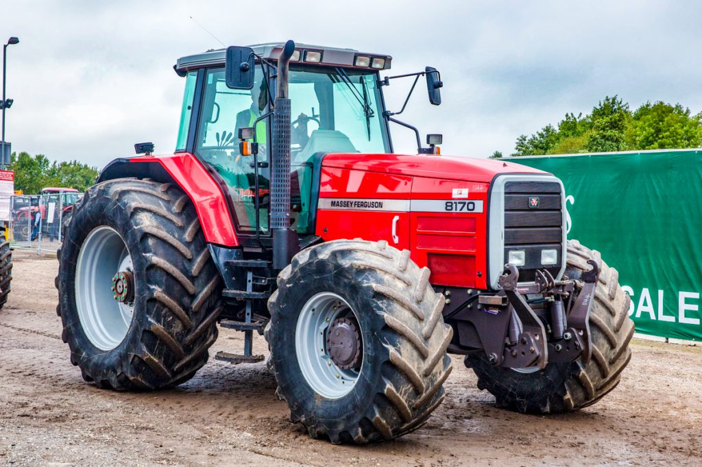 An amazingly clean 1998 Massey Ferguson 8170, equipped with front linkage and oversize tyres, had 3,404 hours on its odometer. It made £11,400