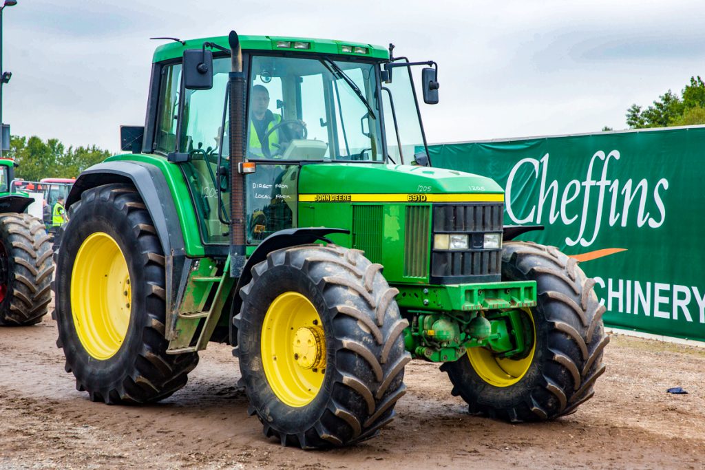 Modern classic: This John Deere 6910, with a PowerQuad gearbox, sold for £17,500. It had 8,667 hours showing on the clock