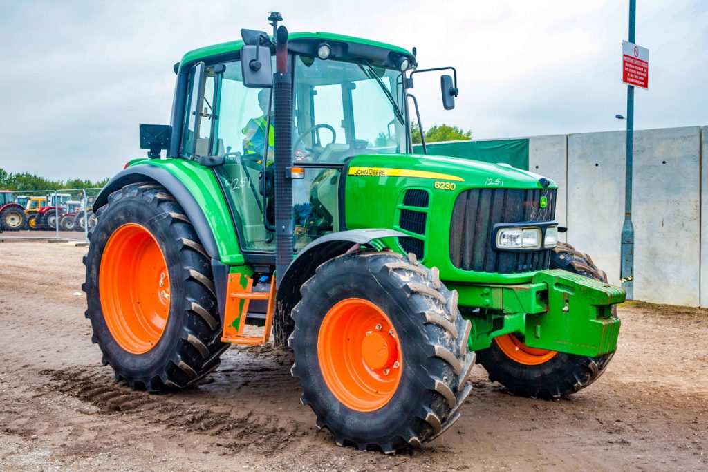 This John Deere 6230, with an unusual colour scheme, had 3,000 hours clocked up. It made £23,800