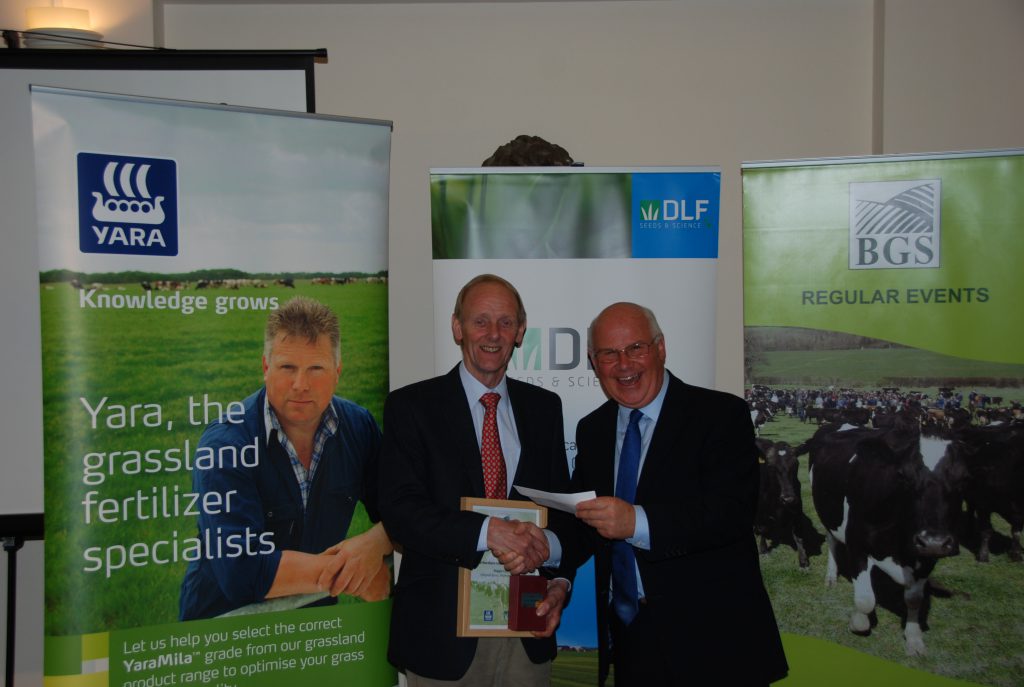 Beattie Lilburn receives a voucher for £250 (€282) worth of DLF seed from Paddy Jack, DLF Business Manager Scotland. DLF is a joint sponsor of the British Grassland Society Grassland Farmer of the Year Award