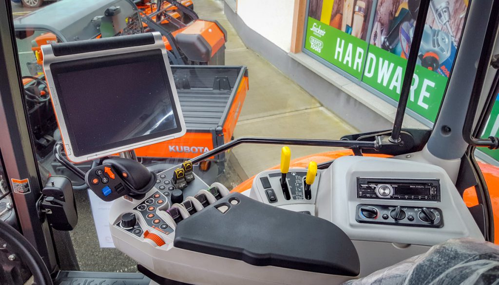 Inside the cab of a 150hp Kubota M7151