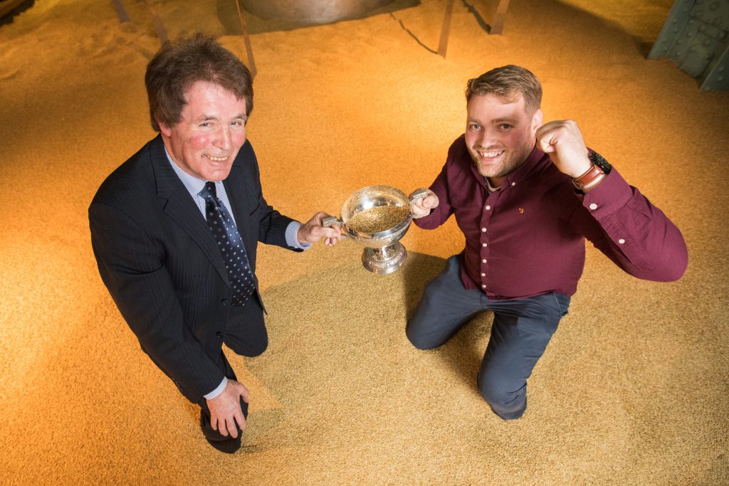 Edward Mulhall and his son James from New Inn, Co. Laois after scooping first prize in the Malting Barley Excellence Awards 2017 at the Guinness Storehouse. Image source: Naoise Culhane