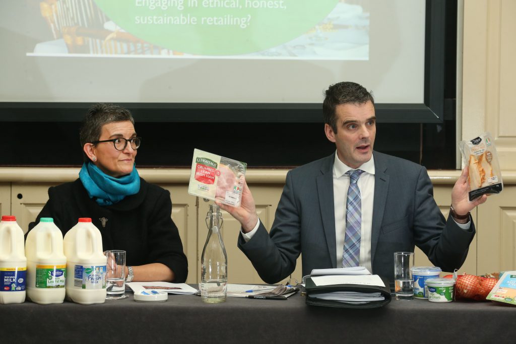 IFA dairy executive Catherine Lascurettes and IFA president Joe Healy show some everyday supermarket examples, as they urge consumers to check twice to make sure the food they buy this Christmas is really Irish, and is priced in an economically sustainable manner. Image source: Finbarr O’Rourke Photography