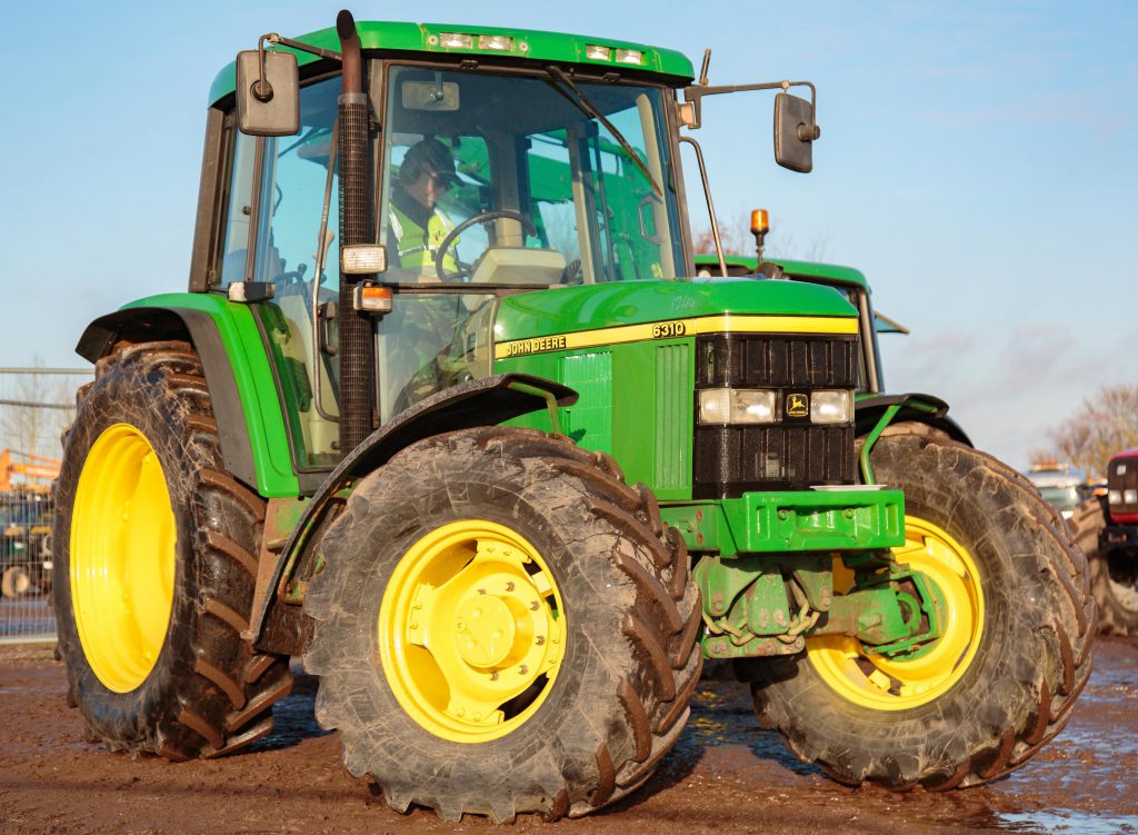 This 1999 John Deere 6310 Premium (PowrQuad; 40kph), with TLS front suspension and a left-hand reverser, had 8,224 hours on the clock. It sold for £16,000