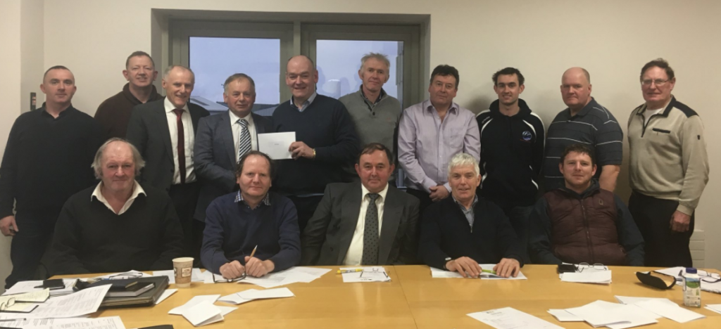 Outgoing Hill Committee chair Pat Dunne, receiving a presentation from new chairman Flor McCarthy. Image source: IFA Twitter page