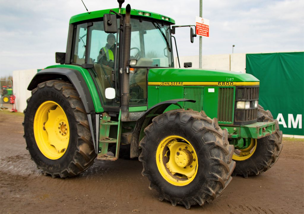 This John Deere 6800 (PowrQuad; 40kph), with air-conditioning, sold for £12,000