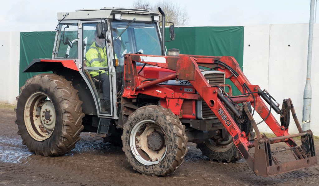 This 1991 Massey Ferguson 375 (12F 12R 'shuttle box'), with a front loader and 4,493 hours showing, sold for £10,700