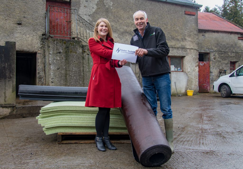 Treasa Keane presenting Tommy with his new Huber Technik rubber mats