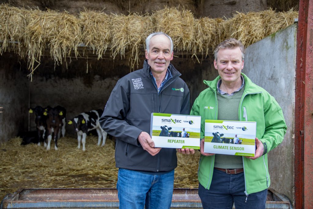 Alan Heaney, from Efficient Farm Solutions, presenting Tommy with his Smaxtec bolus system