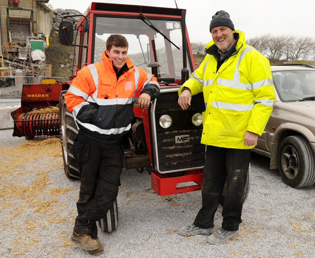 Committee chairman Joe McCarthy (right) with John O’Mahony and his Massey Ferguson 250