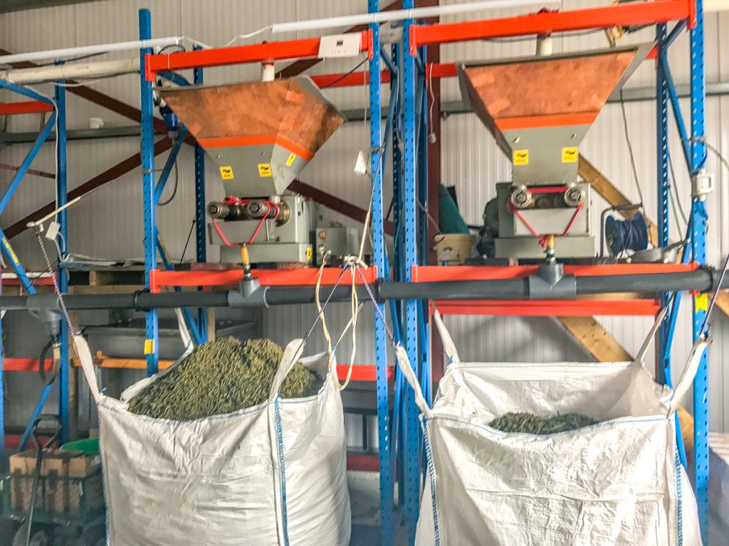 The hoppers are located above the screw press