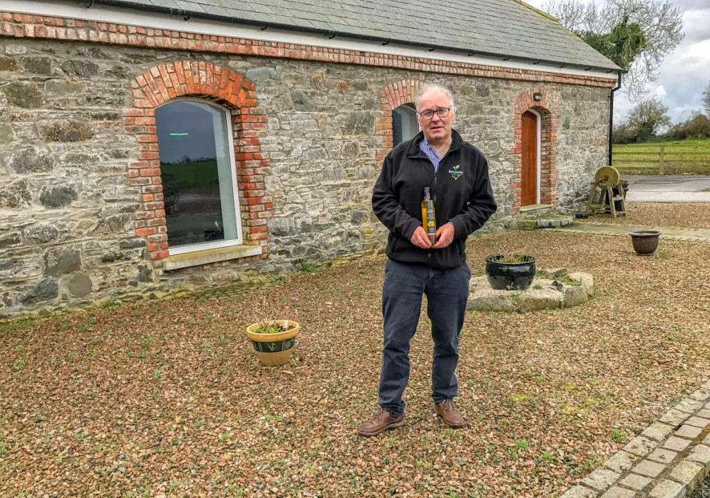 Patrick Rooney outside the oil pressing and bottling plant at Derrycamma Farm