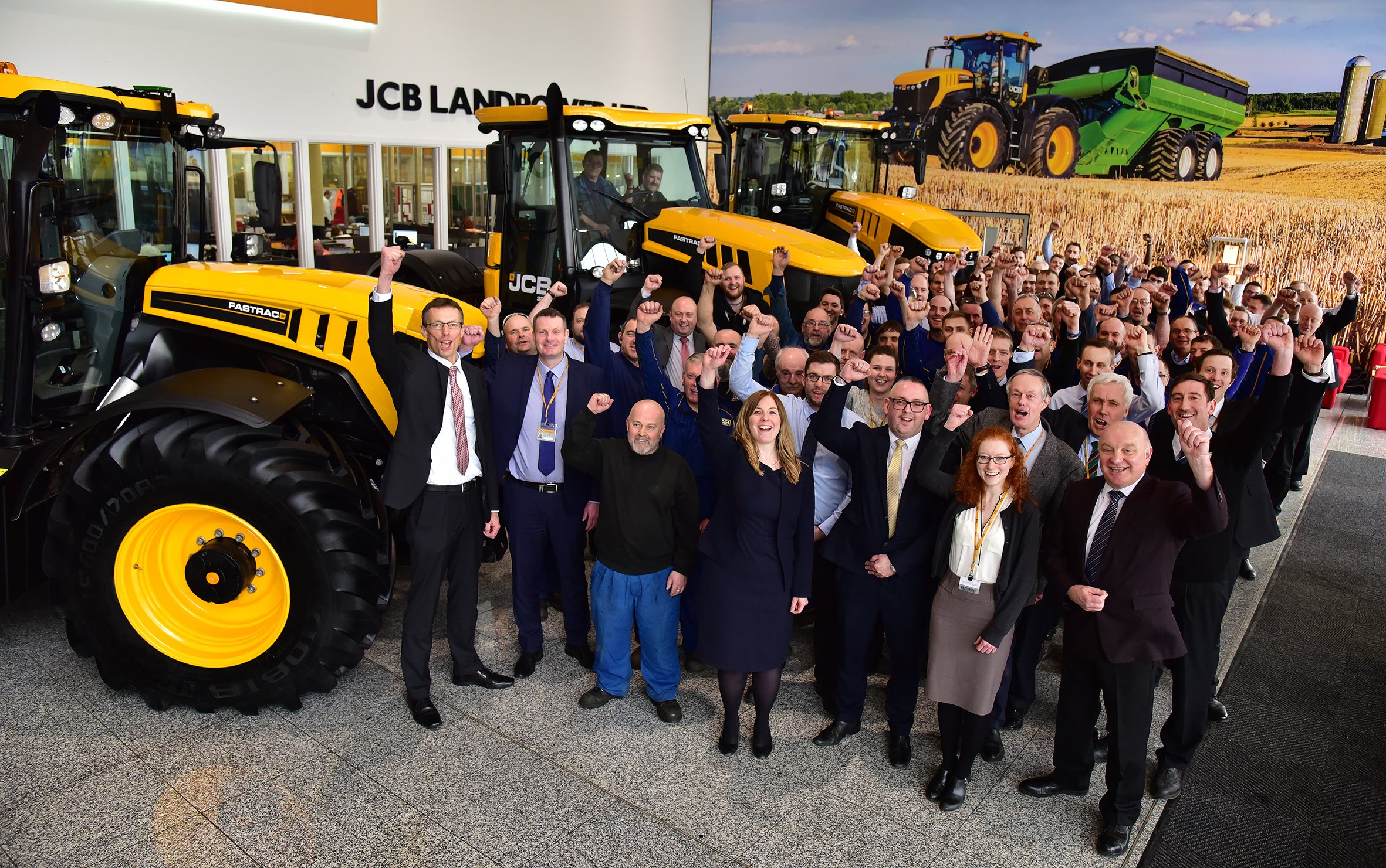 JCB engineering, assembly and sales staff celebrate the Fastrac 3000 Series’ contribution to farming