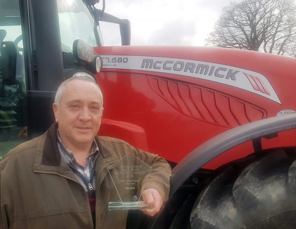 Laurence McMullan, of McCormick dealership H Fulton Tractors, with the Excellence Awards ‘Sales Manager of the Year’ trophy