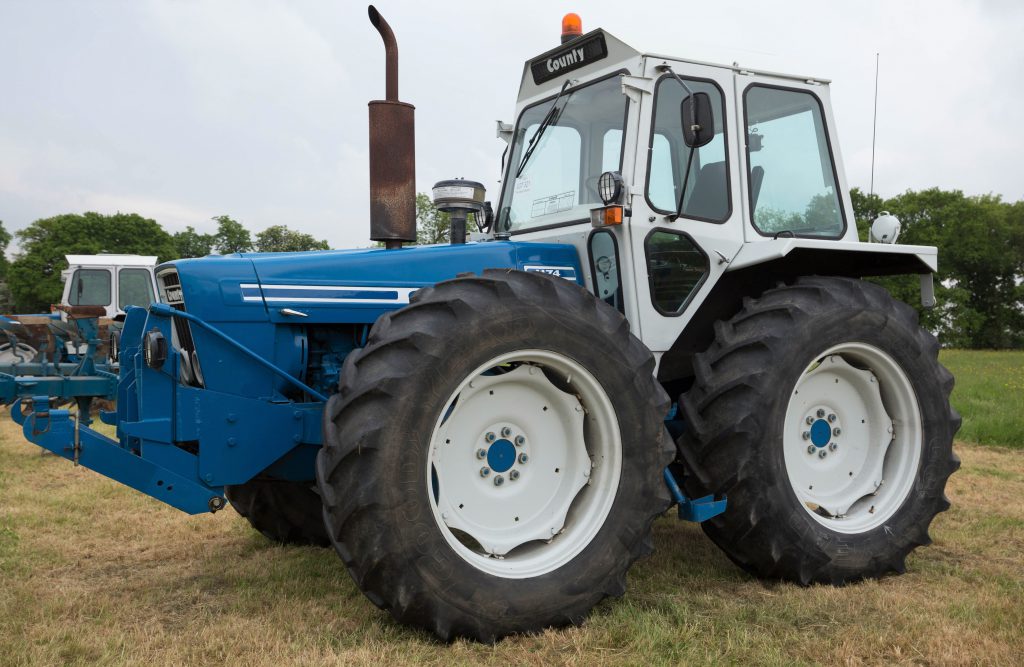 This 1979 County 1174 (front linkage; 16.9 R34 wheels/tyres; 4,384 hours) sold for £34,000