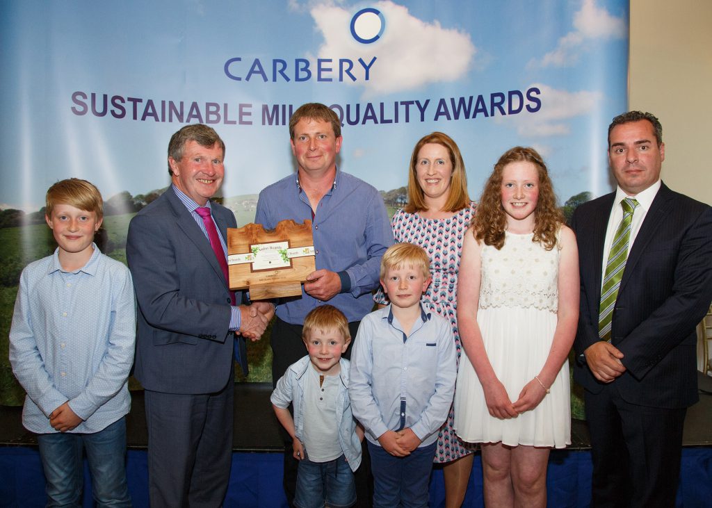 Drinagh Co-op winners. L-R: Peter Fleming, Carbery Group chairman; Brendan and Pauline O’Driscoll,with family, Niall, Ian, Sam and Amy; Jason Hawkins, CEO, Carbery Group. Image source: George Maguire