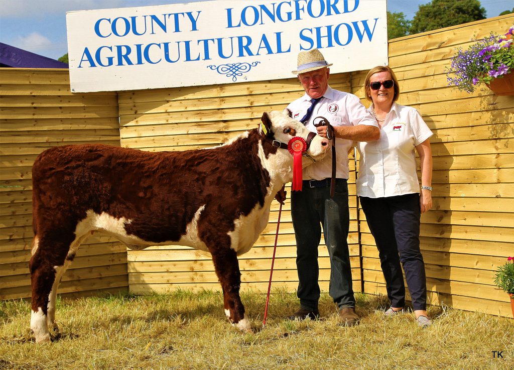Padraig and Catherine McGrath with their six-month-old heifer calf ‘Kye Holly 818’ who won the January Class