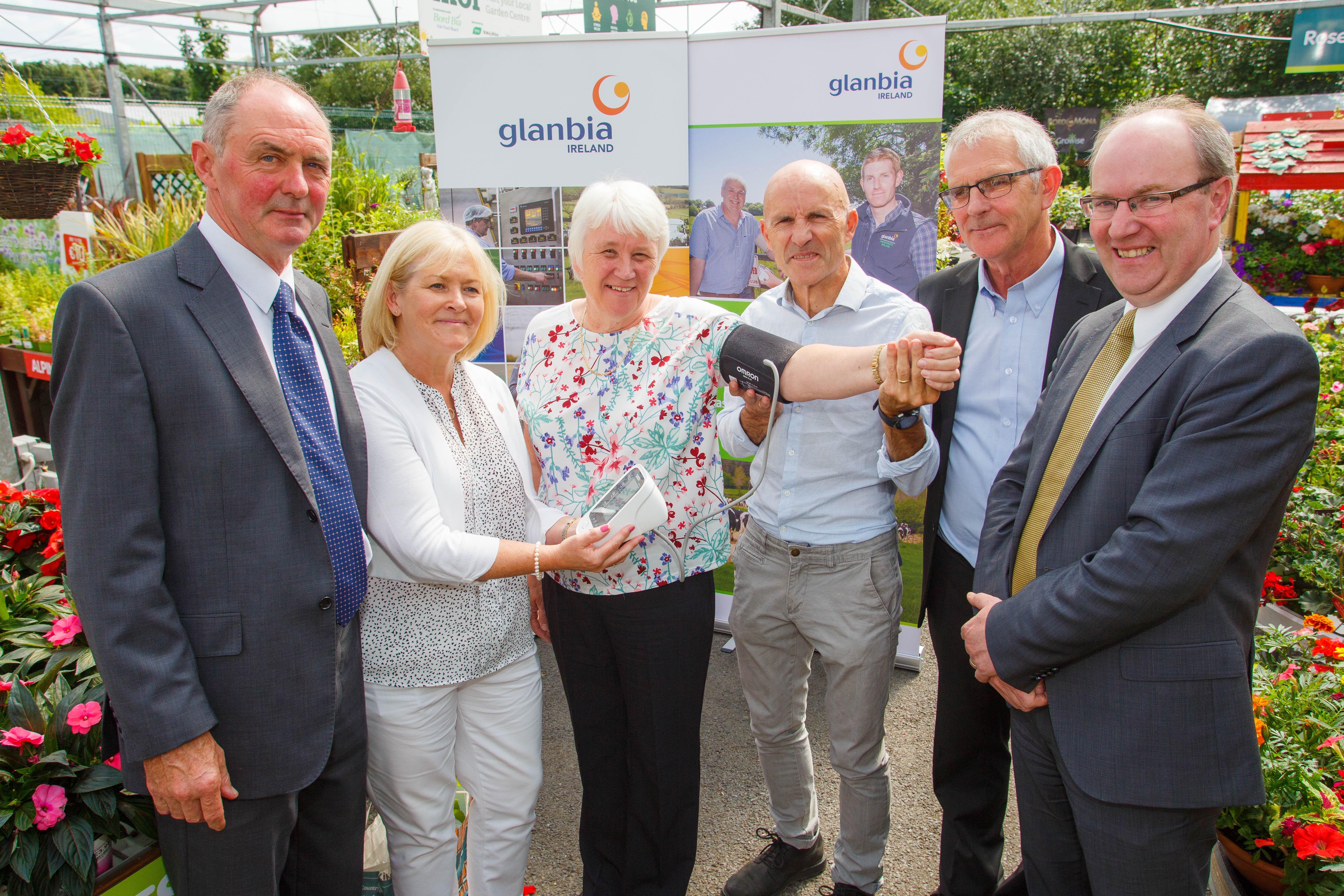 L-R: John Murphy, director, Glanbia plc; Marese Damery, Health Check manager, Irish Heart Foundation; Minister for State Catherine Byrne; Dr. Noel Richardson, lecturer, IT Carlow; Pat Butler, branch manager Glanbia CountryLife, Tullamore; and Sean Molloy, chief agribusiness growth officer. Image source: Jeff Harvey