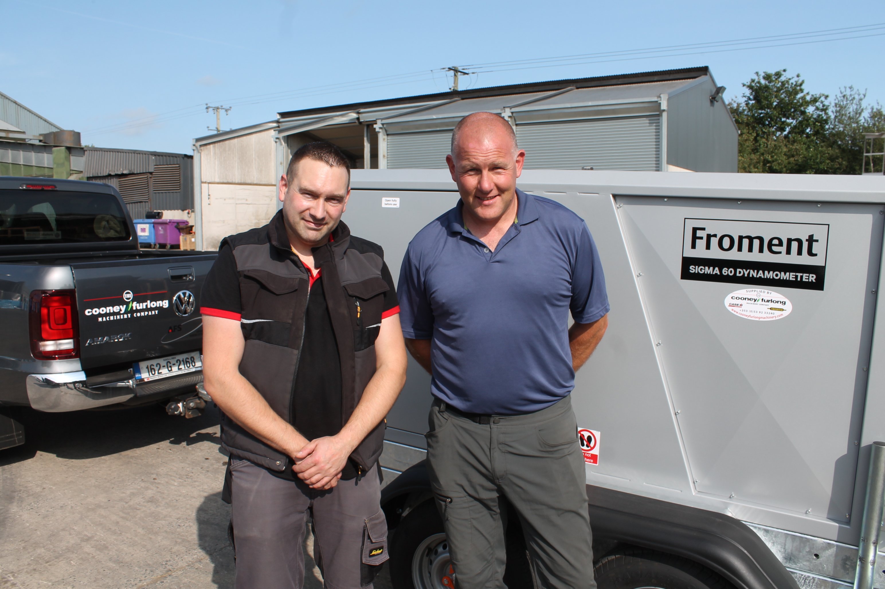 Adam McDonald, DTE Systems, and Barth Landy, general manager at Cooney Furlong Machinery Company