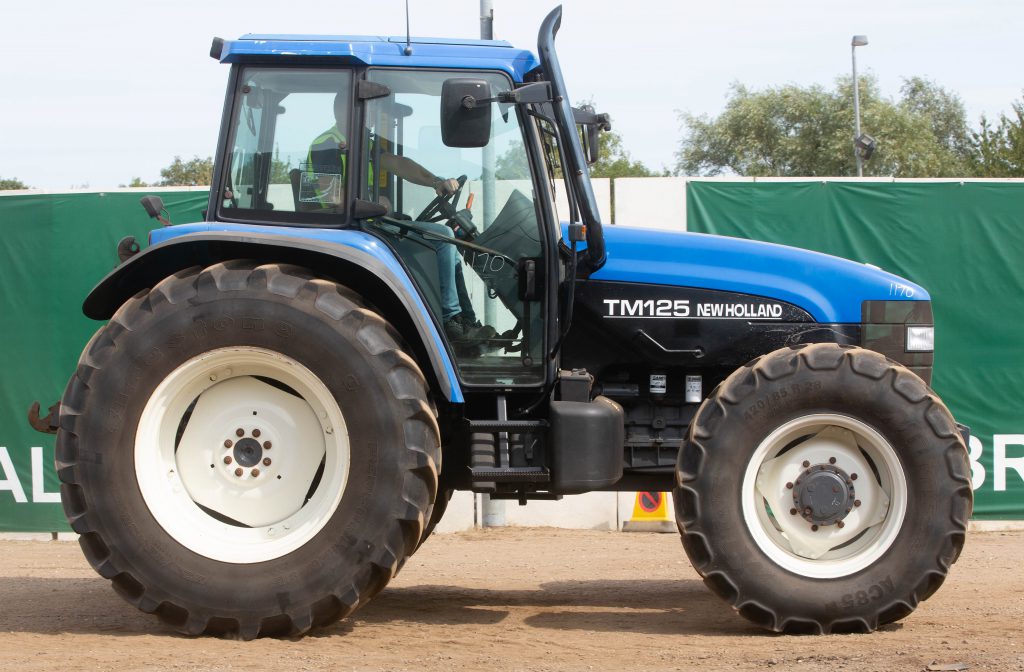 This 2001 New Holland TM125 (10,245 hours) sold for £13,100
