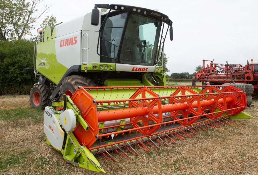 This 2011 Claas Lexion 630 (20ft V600 Vario header; trolley/trailer; side-knife; five-walker; Laser Pilot; 974 engine hours; 820 drum hours) sold for £88,000