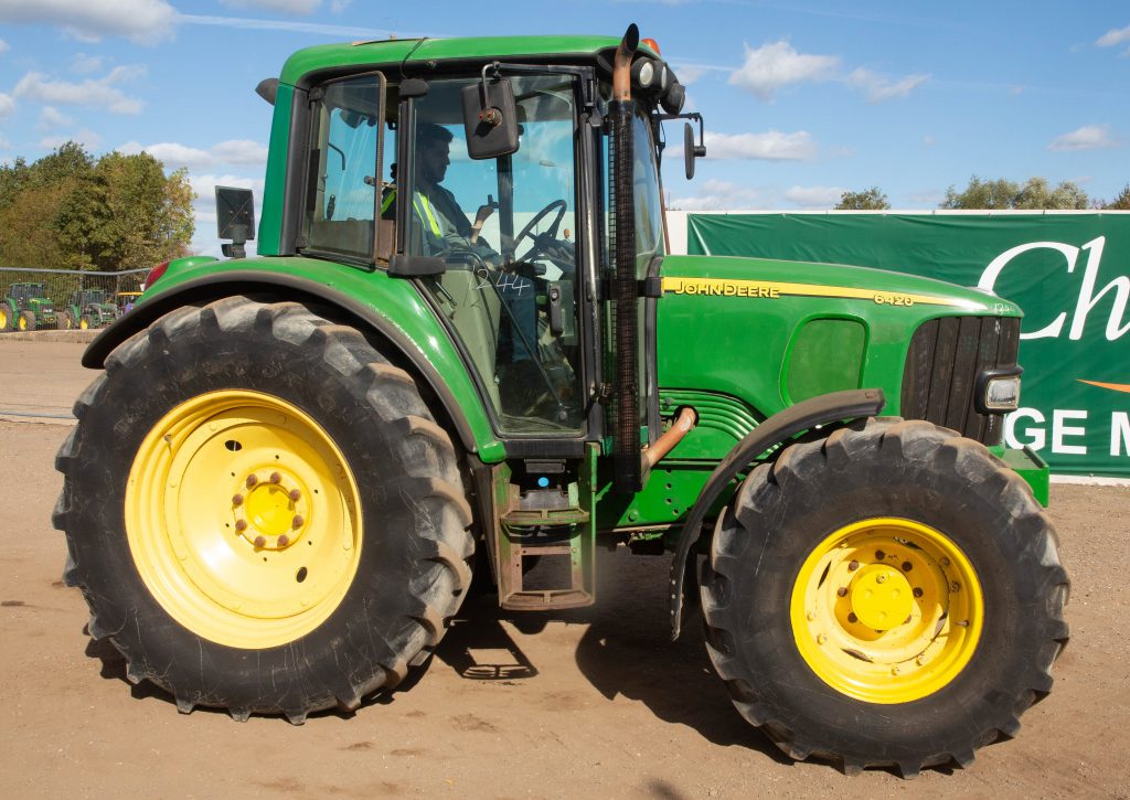 This 2003 John Deere 6420 (PowrQuad; 6,377 hours) sold for £17,200