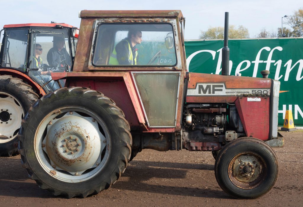 This MF 590 (6,762 hours) sold for £3,000
