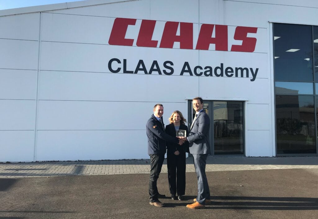 Nigel and Karon Wilson of Ashfield &amp; Wilson (Dungannon, Co. Tyrone) receive a Tractor Sales Performance Award from Claas UK CEO Trevor Tyrrell, for the highest number of sales from a single branch in 12 months