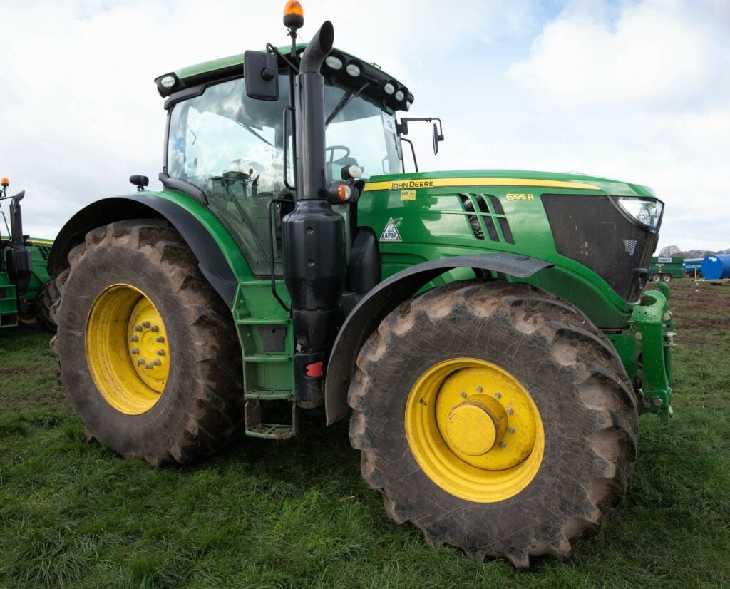 This 2017 John Deere 6195R (AutoQuad; 2,293 hours) sold for £77,000