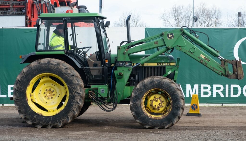 This 1992 John Deere 2650 (John Deere 245 front loader; CC2; 14,434 hours) sold for £5,800